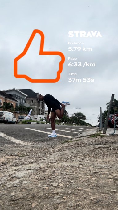 A runner stretches on the side of a road with a Strava overlay showing 'Distance 5.79 km, Pace 6:33 /km, Time 37m 53s' and a large orange thumbs-up graphic.