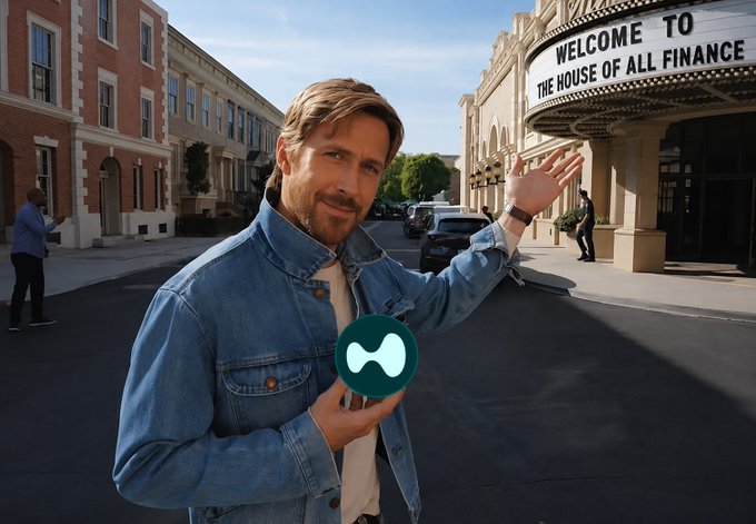 A man in a denim jacket stands on a street holding up a green wave-like logo, gesturing toward a building with a marquee reading 'WELCOME TO THE HOUSE OF ALL FINANCE'.