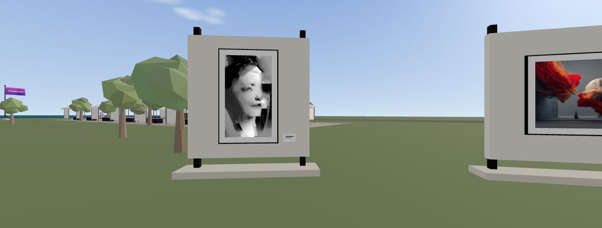A low-poly 3D rendered outdoor scene showing framed artworks displayed on white pedestals in a grassy field with stylized trees and buildings in the background.