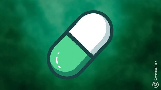 A cartoon-style illustration of a green and white capsule pill on a dark green background, labeled 'Cryptopolitan' in the bottom right corner.