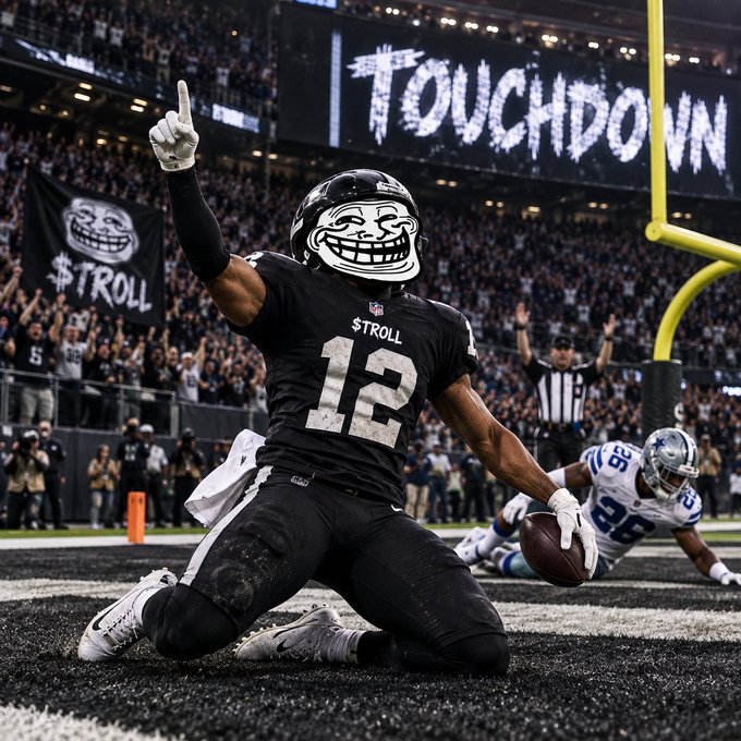 An American football player wearing a black Oakland Raiders jersey with number 12 and a troll face helmet kneels in the end zone, celebrating a touchdown with a "TOUCHDOWN" graphic in the background and a $TROLL banner visible.