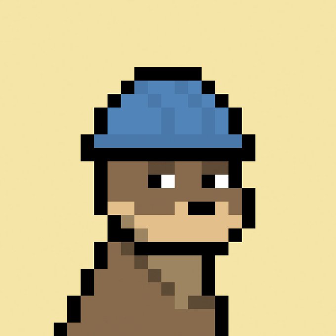 Pixel art illustration of a character's face wearing a blue hat, in the style of an 8-bit video game sprite.
