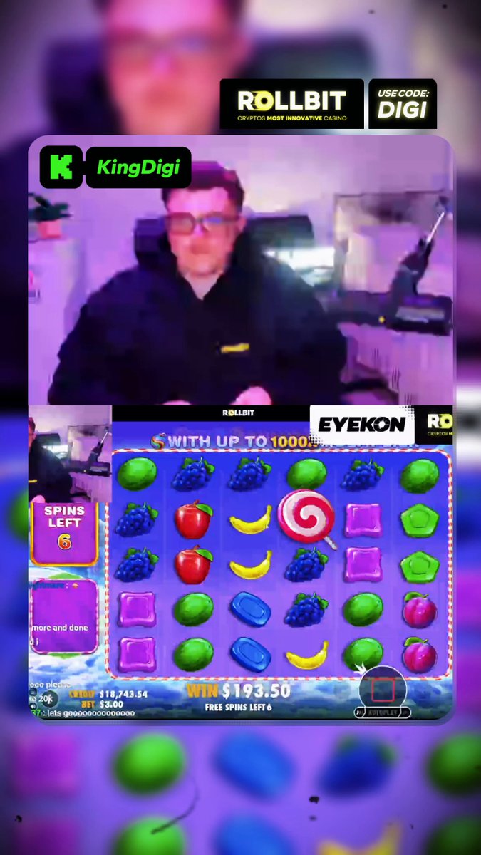 The image shows a man wearing glasses playing a slot machine game, which has purple and green fruit symbols as its theme. The man appears to be focused on his gameplay while surrounded by various fruits such as bananas, apples, and oranges. The caption of the image reads "We are expanding our button clicking skills Ripping @solflare packs today on stream - powered by Collector Crypt". This suggests that the slot machine game is being played in a casino or entertainment venue where players can interact with the game using buttons to play.
