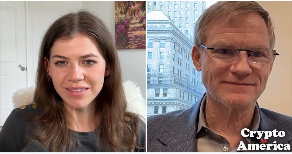 The image features a conversation between two people, with one person wearing glasses and the other wearing a suit. They are discussing the concept of tokenization and its impact on various industries. The woman in the suit is talking about tokenization being everywhere, while the man in the glasses adds to her point by stating that it's not hype but rather an infrastructure shift.

The image also includes text elements related to cryptocurrency, such as "Crypto.America" and "RWA", which further emphasize the discussion on tokenization. The overall atmosphere of the image is professional and informative, with both individuals contributing their thoughts on this emerging trend in finance.