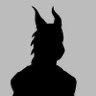 A black silhouette of a wolf or dog-like creature with pointed ears and a fluffy mane against a plain white background.