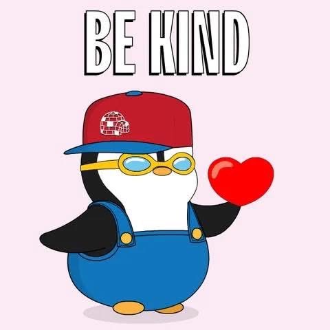 A cartoon penguin wearing a red cap, blue overalls, and yellow goggles holds a red heart, with the bold text "BE KIND" displayed above. The image ties directly to the post's message about seeking out kindness, likely representing the Pudgy Penguins NFT community referenced in the tweet.