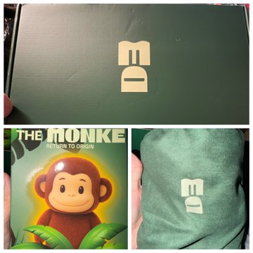 The image shows a Monke DAO green box, a "THE MONKE - RETURN TO ORIGIN" comic-style book featuring a cartoon monkey, and a green hoodie with the Monke DAO logo. This corresponds to the post about receiving "Monkebubu" merchandise in the mail, including a Monke DAO hoodie and presumably Solflare merchandise.