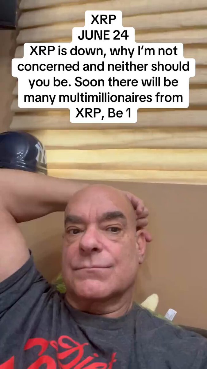 "The image features a bald man wearing a gray t-shirt leaning his head against a wall, with the text on the image providing information about Ripple and Bitcoin. The caption suggests that despite the price fluctuations, XRP should be considered valuable due to its utility, adoption, and potential for future growth. This relates to the broader concept of patience in uncertain times as the focus is on adopting and investing in long-term opportunities rather than daily market swings."