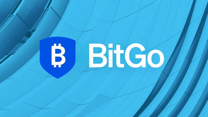 The image displays the BitGo logo, featuring a blue shield with a white Bitcoin symbol next to the company name "BitGo" in white text against a teal architectural background. It relates to the accompanying news by visually branding BitGo as the key player transferring $7.7 billion in Wrapped Bitcoin (WBTC) to Chainlink's CCIP protocol following the LayerZero bridge exploit.