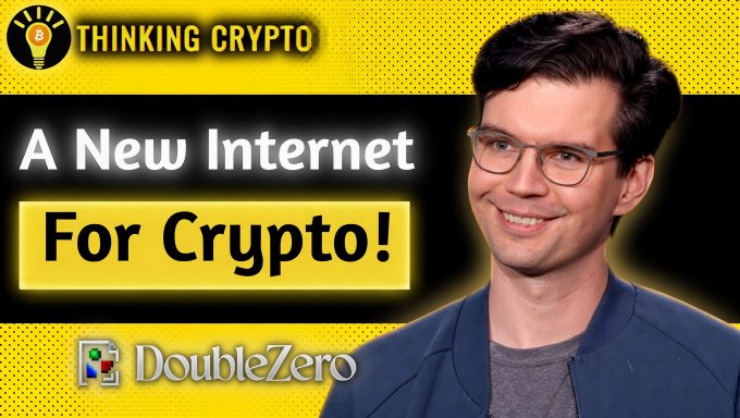 A man with glasses and a blue shirt smiles, accompanied by the text "Thinking Crypto" and "A new internet for crypto!"