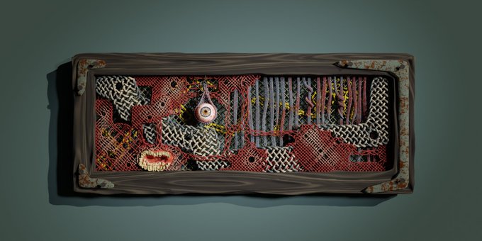 A textured rectangular artwork in a wooden frame appears to be made of woven mesh, fabric, and found objects, featuring a prominent eyeball element and teeth in a chaotic, mummy-like design.
