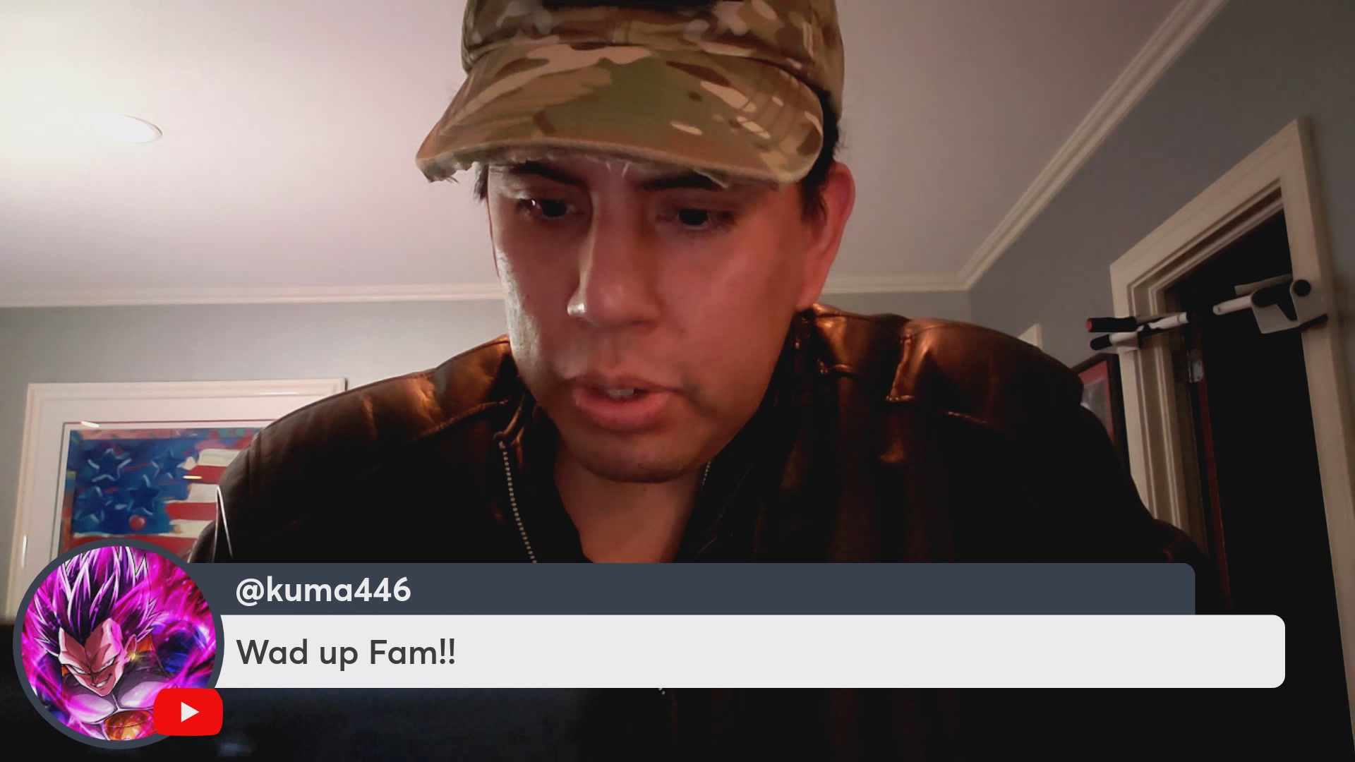 The image features a man wearing a camo hat sitting at a desk while looking down at his computer screen. The caption of the image reads "Chavez podcast #307 with Bren Tradess on VeeFriends, VeVe, $OMI $SPCX and more!". This suggests that the man is likely participating in a podcast or online event related to farming or agriculture.