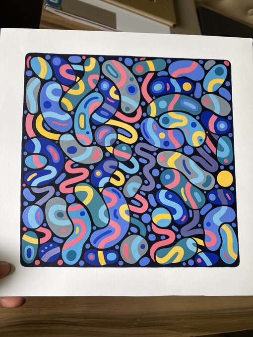 A vibrant abstract painting displays an array of colorful, swirling, bean-like shapes in pink, blue, yellow, and gray on a dark blue background.