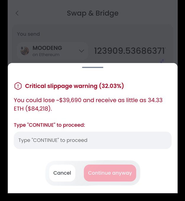 A crypto Swap & Bridge interface warns of 'Critical slippage warning (32.03%)' indicating a potential loss of ~$39,690 when swapping MOODENG on Ethereum, with a prompt to type 'CONTINUE' to proceed.