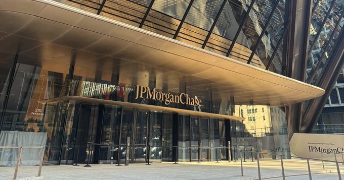 Exterior view of the JPMorgan Chase building featuring its modern glass entrance and signage.