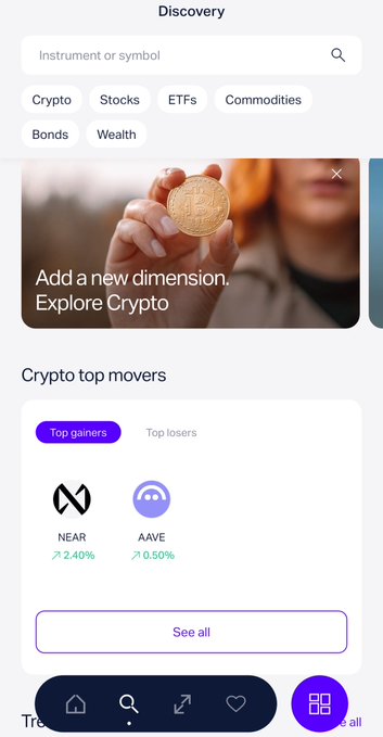 A mobile banking app's "Discovery" section shows asset categories like Crypto, Stocks, ETFs, Commodities, Bonds, and Wealth, with a "Crypto top movers" section highlighting NEAR (+2.40%) and AAVE (+0.50%) as top gainers, supporting the post about a Dubai-based bank offering in-app crypto trading.