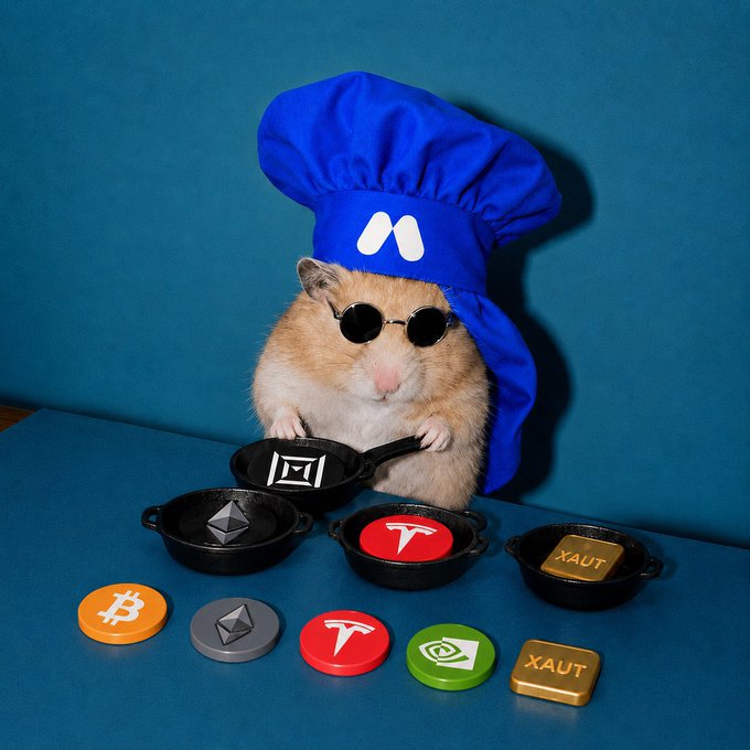 The image features a hamster wearing a blue chef's hat and sunglasses sitting at a table with various objects such as a frying pan, bitcoin, and other symbols like "Xaut" and "ETH". The hamster appears to be holding a small black pot in its paws while surrounded by these items. The post seems to be related to the hamster's activities or interests, possibly discussing the hamster's hobbies or achievements involving these objects.