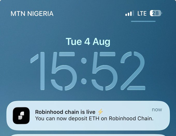 A smartphone lock screen on MTN Nigeria shows the date "Tue 4 Aug" and time 15:52, with a notification announcing "Robinhood chain is live" and that users can now deposit ETH on Robinhood Chain.