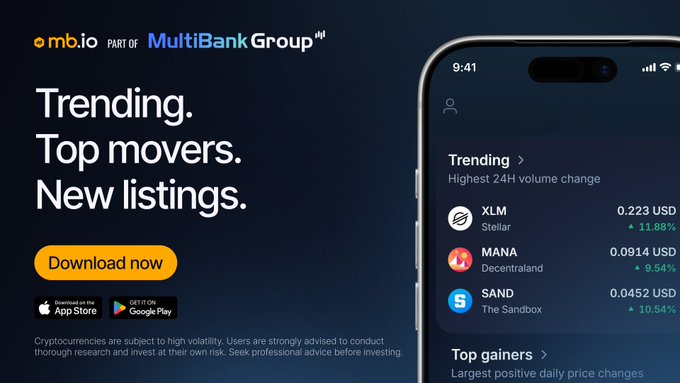 An advertisement for the "omb.io" app by "MultiBank Group" displays text like "Trending. Top movers. New listings." alongside a smartphone showing crypto prices for XLM, MANA, and SAND.