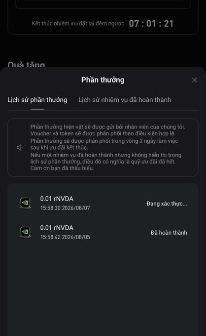A screenshot of a rewards page ("Phần thưởng") showing two 0.01 NVDA (Nvidia) stock rewards, one dated 2026/08/07 marked as "Đang xác thực..." (verifying) and another from 2026/08/05 marked as "Đã hoàn thành" (completed), matching the post about receiving Nvidia shares as rewards from a Bitget trading event.