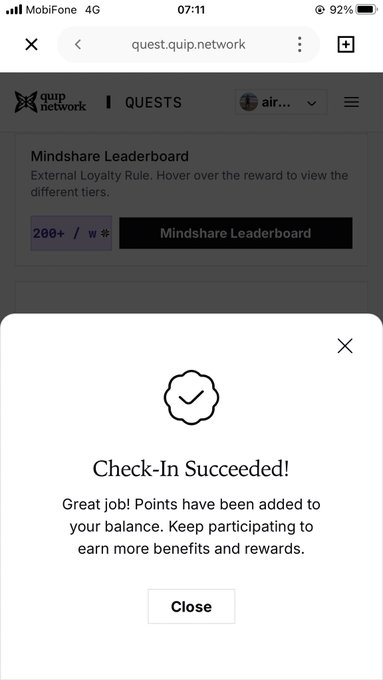 A mobile screenshot from quest.quip.network showing a "Mindshare Leaderboard" page with a pop-up modal confirming "Check-In Succeeded!" and instructing the user that points have been added to their balance, with a "Close" button below.