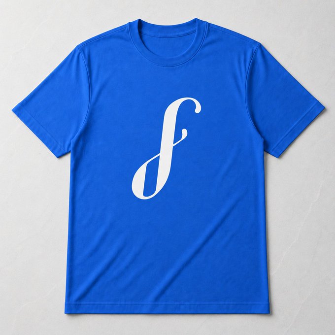 A blue T-shirt featuring a stylized white "f" logo in elegant cursive script, representing the "Forever Library T-shirt: Tezos, 1st Edition" digital NFT wearable available on objkt.com.