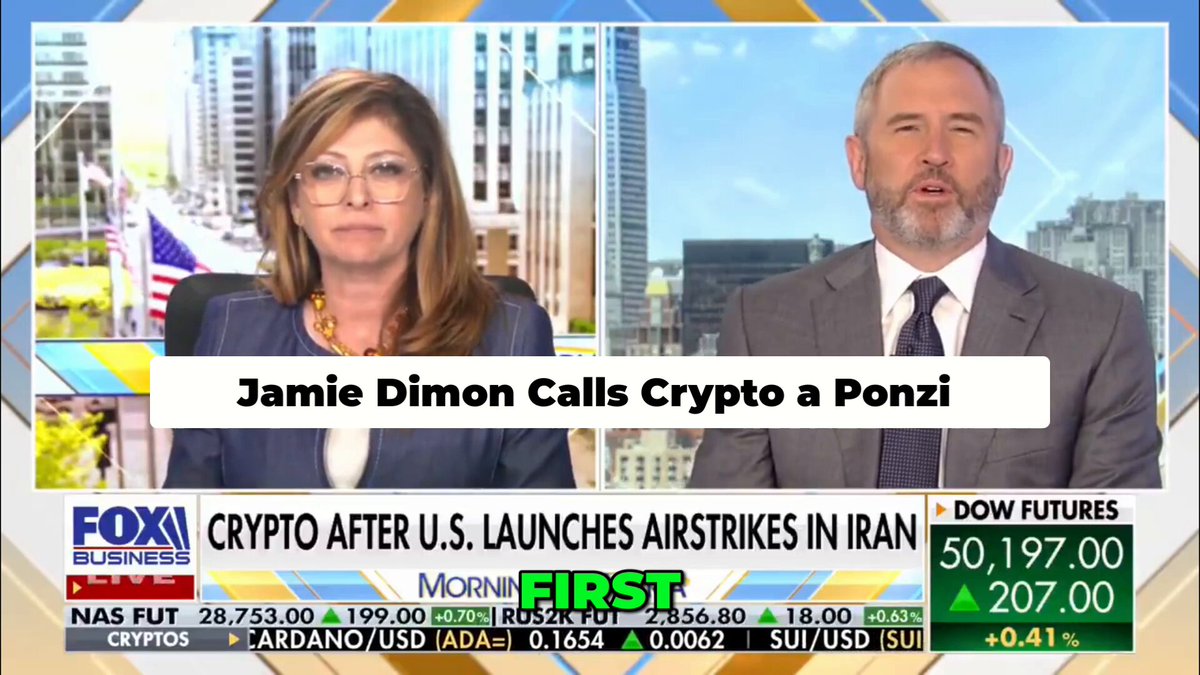 The image shows a news segment featuring two people, one man and one woman, discussing cryptocurrency and its impact on the economy. The man is wearing a suit and tie while the woman has her hair pulled back into a ponytail. They are both sitting at a desk with a TV screen in front of them. The background includes an image of a city skyline, suggesting that they might be reporting from an urban location or discussing the financial implications of cryptocurrency in such a setting.