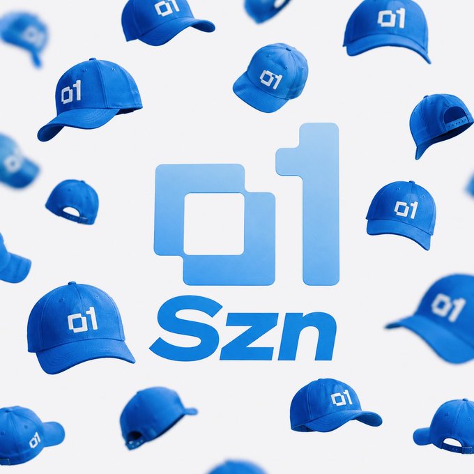 A promotional graphic with blue '01' logos and the word 'Szn' surrounded by floating blue baseball caps.