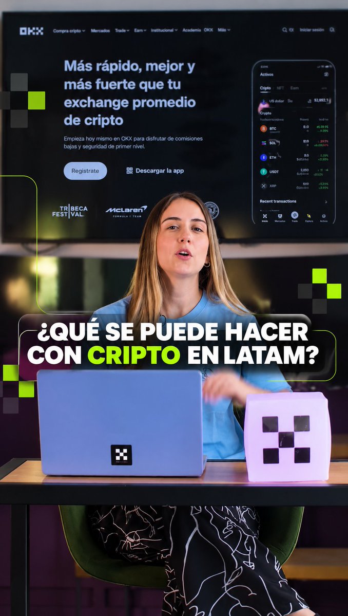 A woman sits in front of a screen displaying the OKX crypto exchange website, with text asking '¿QUÉ SE PUEDE HACER CON CRIPTO EN LATAM?'.