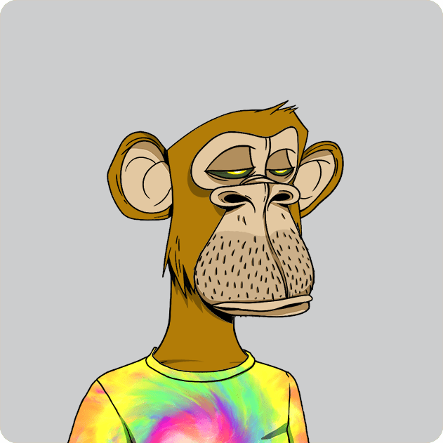 The image features a cartoon monkey wearing a tie-dyed shirt with yellow, green, blue, and red colors. The monkey appears to be looking off into space or daydreaming while standing against a gray background. There are no texts present in the image.
