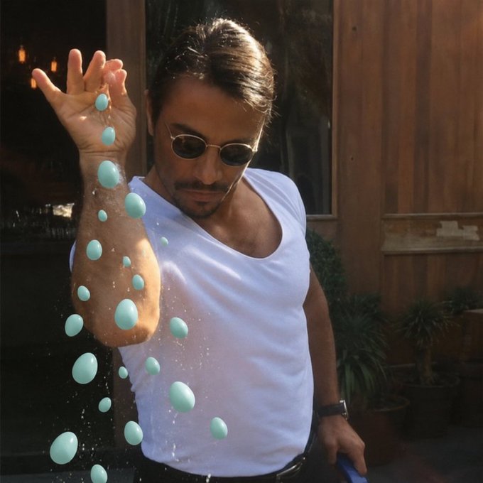 A man wearing sunglasses and a white tank top holds up his arm while digitally edited light blue/cyan orbs appear to drip or float from his skin in a surreal, eye-catching effect. The image has no visible text, numbers, or tickers, but its stylized, eye-catching visual seems designed to symbolize the "liquid" or "dripping" wealth and high-value crypto holdings referenced in the accompanying post about CT having the most "HL maxis" and sending "8 figs" worth of coins across EVM chains.