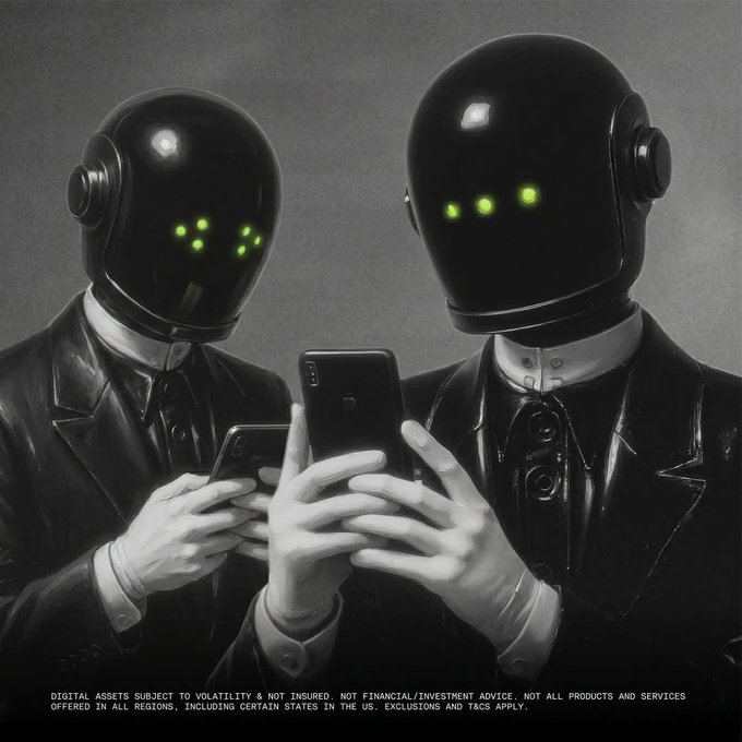 Two figures in dark suits and helmets with glowing green dots for eyes examine smartphones, with a disclaimer reading 'DIGITAL ASSETS SUBJECT TO VOLATILITY & NOT INSURED. NOT FINANCIAL/INVESTMENT ADVICE.'