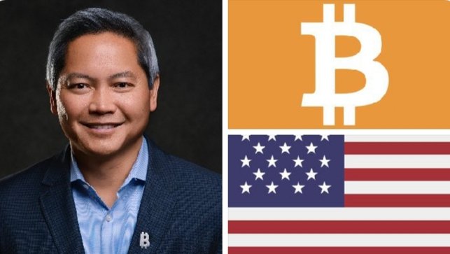 The image features a man wearing a suit standing next to an American flag with the word "bitcoin" written above it. The text suggests that the United States is actively engaging in the development of Bitcoin technology, which could potentially lead to its growth as a global leader in this digital currency.
