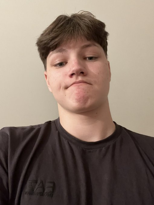 A young man takes a selfie with a neutral expression, marking "day 102" of a series of selfies intended to support the $PENGU token as it tracks toward a $1 target. The image serves as a personal progress update despite a recent 24h price change of -6% (0.006).