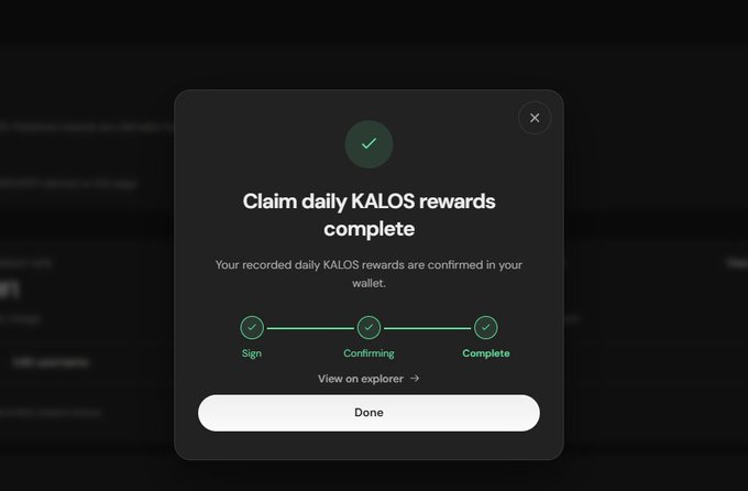 A digital confirmation dialog box displaying 'Claim daily KALOS rewards complete' with a progress tracker showing Sign, Confirming, and Complete steps all checked.