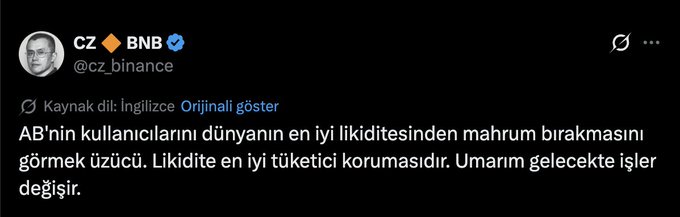 A screenshot of a Turkish-language tweet from CZ Binance (@cz_binance) expressing sadness that the US is depriving its users from the world's best liquidity, stating that liquidity is the best consumer protection, and hoping things change in the future. The tweet serves as the basis for criticism that CZ is deflecting blame rather than acknowledging regulatory compliance failures.