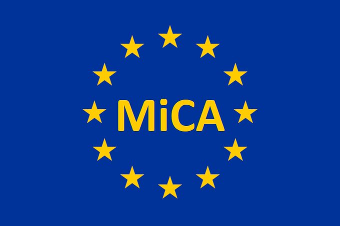 The image displays the MiCA (Markets in Crypto-Assets) logo, featuring twelve yellow stars arranged in a circle around the bold yellow "MiCA" text on a blue background, mirroring the iconic European Union flag design. This visually represents the EU's landmark crypto regulation referenced in the post, under which the number of registered crypto firms has plummeted from 2,700 to roughly 200 as compliance with the new CASP licensing framework took effect after the transition period ended.