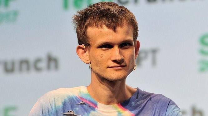 A young man with short brown hair wearing a tie-dye shirt speaks into a headset microphone at what appears to be a TechCrunch event, with the partial text "Crunch" and "PT" visible in the blurred background. The image relates to the post as it likely shows the crypto trader @Ryker_Crypto, referenced for his bold $ETH price prediction.