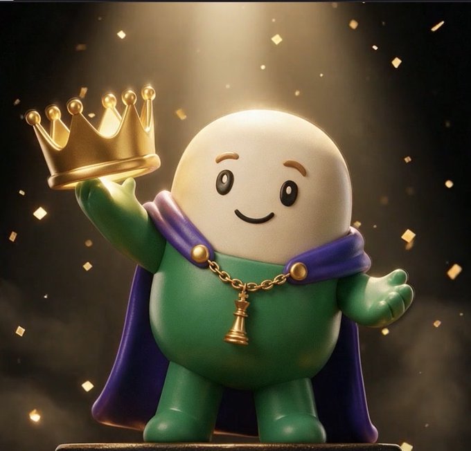 A 3D illustration of a round, smiling cartoon character wearing a green outfit, purple cape, and gold necklace, holding up a golden crown amidst falling confetti.