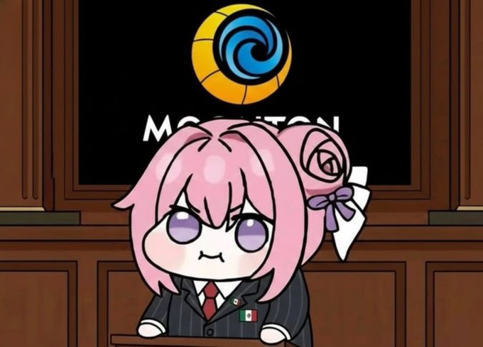 A chibi-style pink-haired anime girl with a smug expression stands at a podium in what appears to be a courtroom, with a "MOTION" logo and a Mexican flag pin visible on her pinstripe suit, humorously paired with the caption about "The Elizabeth warren dump."