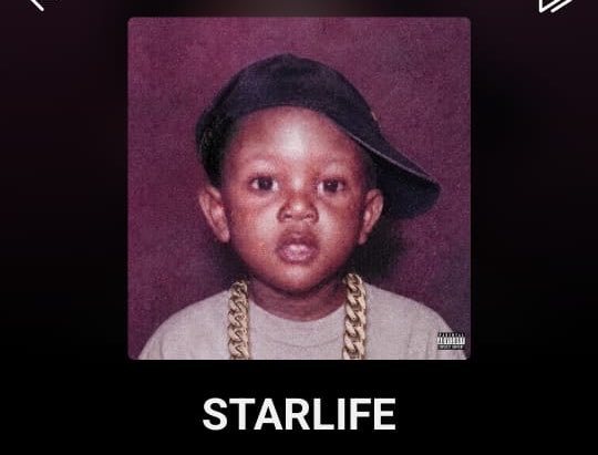 Album cover showing a young child wearing a backwards baseball cap and gold chains against a purple background, with 'STARLIFE' text at the bottom and a parental advisory label.