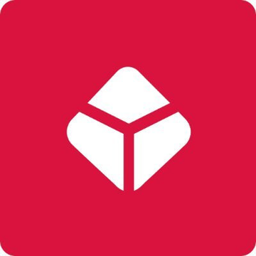 The image displays a white cube/diamond icon on a bright red rounded-square background, which appears to be a logo or app icon associated with Blockchain.com. The geometric cube symbol connects to the context of the post about Blockchain.com applying for CFTC licenses to offer prediction markets and crypto derivatives in the US, representing the company's blockchain technology focus.