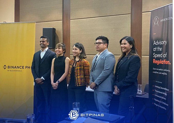 Five professionals pose at a Binance Philippines by Blockschills event, standing between a yellow Binance PH banner and an Arden Consult banner promoting "Advisory at the Speed of Regulation," matching the post's description of a roundtable led by APAC head SB Seker, General Manager Jen Bilango, and Arden Consult representatives.