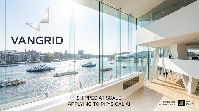 A modern office interior overlooking a river with boats and a city skyline, featuring the text 'VANGRID', 'SHIPPED AT SCALE, APPLYING TO PHYSICAL AI.', and 'AMSTERDAM, THE NETHERLANDS' alongside NVIDIA logos.