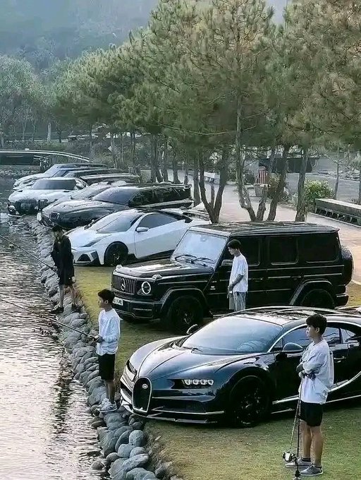 The image shows a group of people standing near several luxury cars parked next to a body of water, possibly a river or lake. The cars are positioned at various angles, showcasing their sleek designs and shiny exteriors. The scene appears to be set in an urban environment with trees nearby, creating a picturesque backdrop for the gathering.

The post features a caption that reads "Happy new morning Architectural blueprint: why FIH is native to Solana To build a high-velocity data economy integrated with prediction markets and deep DeFi utility, legacy blockchains simply won't cut it". This suggests that the image might be related to a discussion or event about the future of FinTech and its integration into the financial ecosystem. The presence of luxury cars in the scene further emphasizes this theme by highlighting the potential for innovation and disruption within the industry.