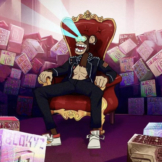 An animated cartoon monkey wearing sunglasses, a black leather jacket, and a gold chain sits on a red velvet throne surrounded by stacks of 'BLOKYZ' boxes.