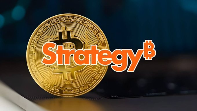 A golden Bitcoin coin with the orange text 'Strategy' overlaid, likely referencing the company formerly known as MicroStrategy.