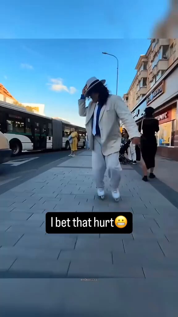 The image features a man dressed in a suit and hat walking down a sidewalk while holding an umbrella. The caption of the image includes the words "I bet that hurt" which could be interpreted as a humorous or satirical statement about the current state of online content creation, where people are constantly creating and sharing content on platforms like Twitter and Instagram. This caption suggests that there is a growing trend towards quality participation in these communities rather than just focusing on quantity and popularity. The image also includes an emojis "I bet that hurt" which adds to its humorous nature.