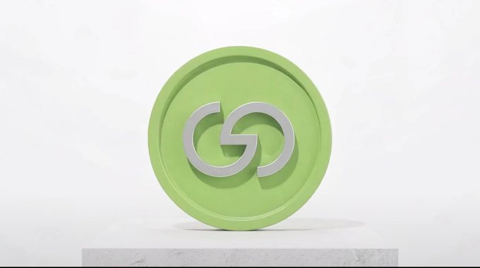 A clean 3D graphic shows a green circular emblem with a silver interlocking-loop symbol standing on a small pedestal.