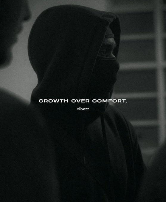 A black-and-white, grainy photo of a person wearing a hood and face covering features the motivational quote 'GROWTH OVER COMFORT.' by 'vibezz' overlaid in the center.